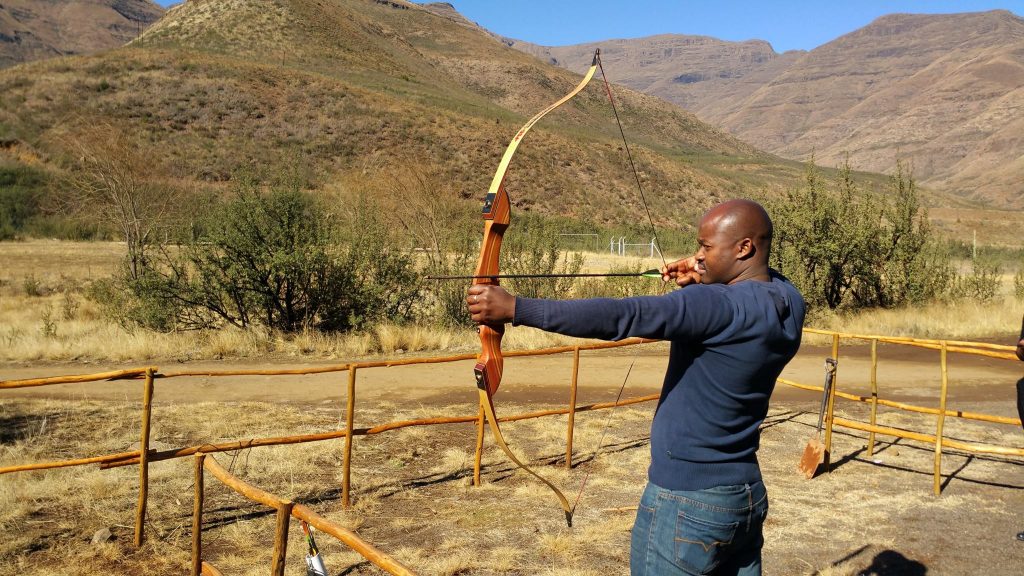 Archery at Maliba with mountains in the background